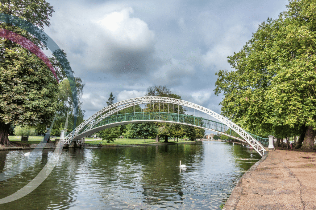 Bedford Embankment and the River Great Ouse with tree-lined riverside views and historic buildings.
